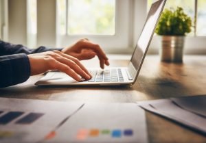 white label businessman using laptop computer sitting working office